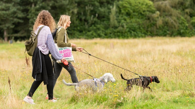 Two ladies dog walking at Gibside